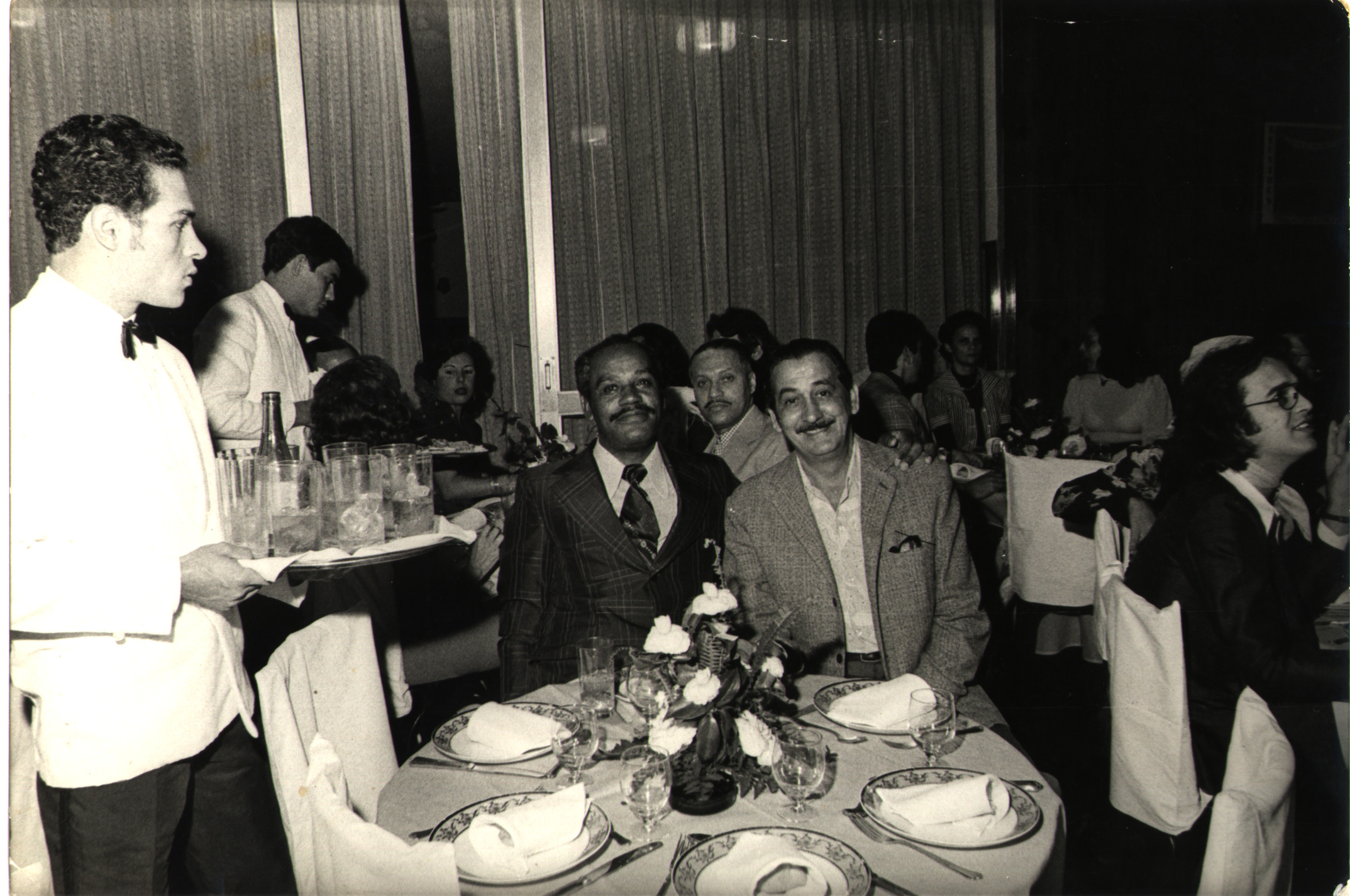 Jantar de recepção promovido pelo BNDES em sua tradicional festa de fim de ano na Associação Comercial. Segundo o entrevistado, foi um 