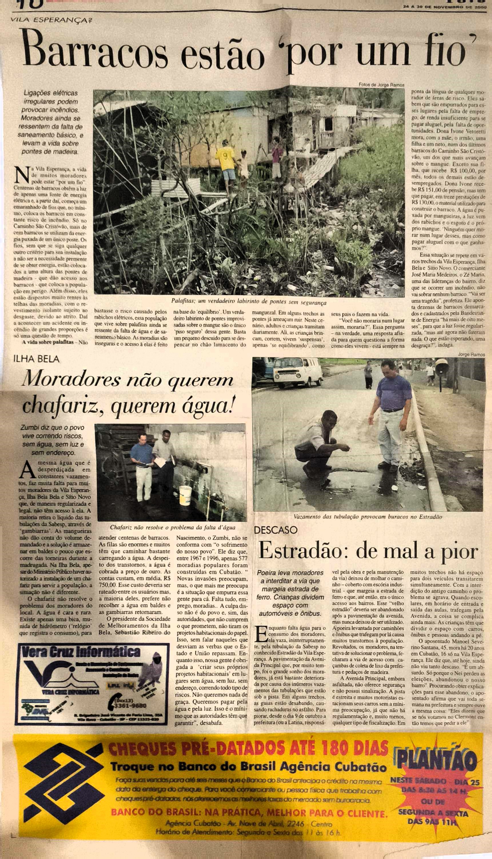 Matéria jornalística relatando diversos problemas enfrentados pela Vila Esperança, incluindo a dependência de um chafariz improvisado pelos moradores para suprir a falta de água encanada e as moradias insalubres em palafitas. O texto apresenta também Zumbi mostrando problemas estruturais do Estradão, como vazamentos e buracos. Este documento captura um período crítico da comunidade, anterior às melhorias conquistadas por meio de forte mobilização social e das associações lideradas por Zumbi.
