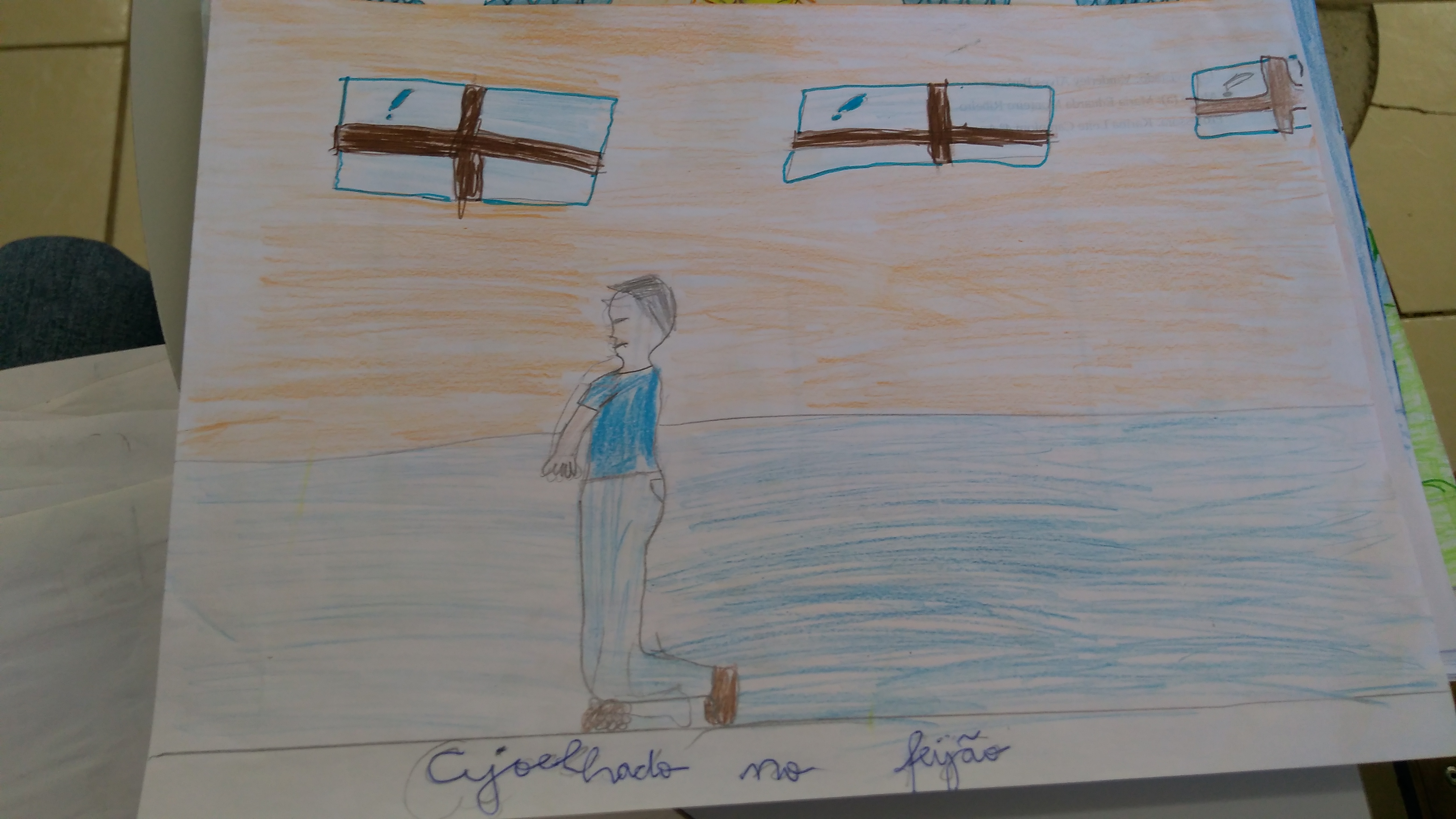 Sr. Vanderlei ajoelhado no feijão
