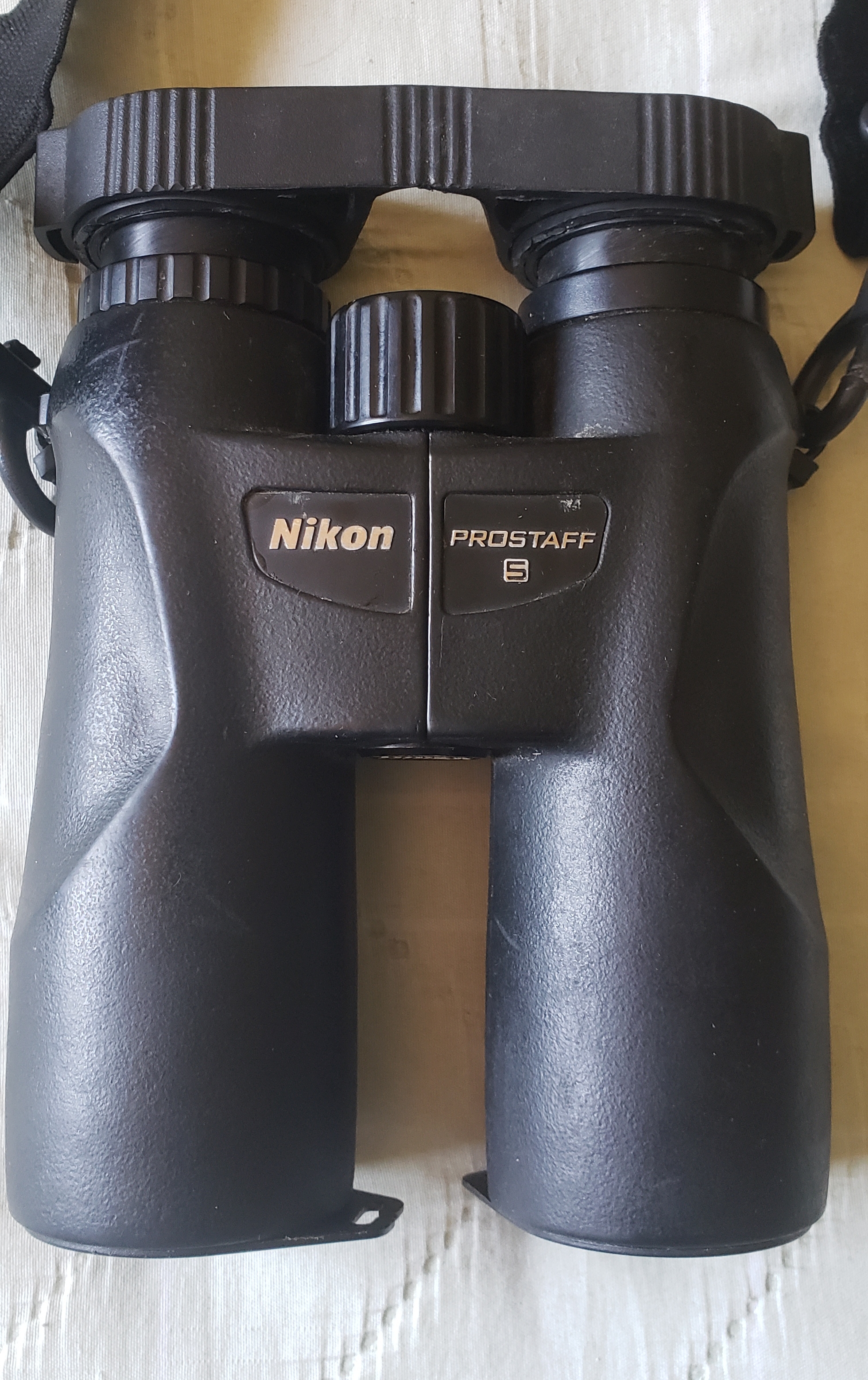 Binóculo, representa mudança na vida, com o trabalho de guia de observação de aves.