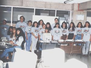 Evauri junto da equipe da central de atendimento, ao todo são dezessete pessoas. Quando a equipe conquistou a ISO 9002  para a CTBC telecom.