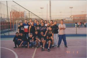 Grupo de Jovens da Associação Eremim, no bairro do rochedole. A fotografia foi tirada no Metal Clube, onde fica a Eremim. A fotografia foi dada de presente para Gilmar, pelo professor de educação física, o Macarrão, por ocasião da despedida do grupo. Na foto estão : Suelen, Mota (Professroa de educação física), Márcia Carvalho, Joanio, Jadson Ferreira, Elisangela, Andressa, Bruno Siebra, Adriano Evangelista, Cris, Normanda, Marluce, Geisane Ferreira, Vitor, Marcela Martins, Gilmar, Wellington Clemente, Sheila, Gircicleide Ferreira, Isabel Mendes, Suelene. A foto tem uma dedicatória no Verso.