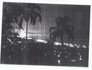 Foto tirada do quarto do hotel em Santos nos seus primeiros dias chegando do Rio Grande do Sul. A praia vista do porto.