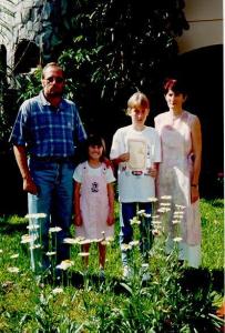Esq. para dir.:  Romualdo, Nicole, Raphael e Maria Isabel. Foto tirada na primeira comunhão do filho Raphael