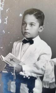 Carlos em sua primeira comunhão aos 7 anos de idade.